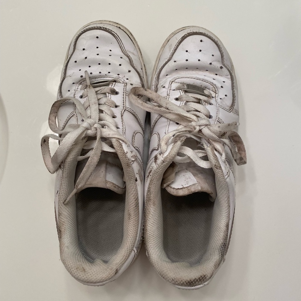 Well-worn ladies Nike Air Force 1 shoes